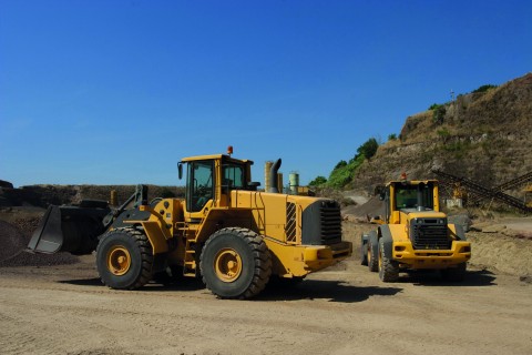 Banden voor bulldozers: welke eigenschappen zijn belangrijk?