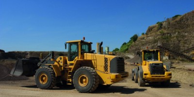 Banden voor bulldozers: welke eigenschappen zijn belangrijk?